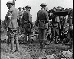 Stretchers: Several Injured Men Are Lying On Stretchers