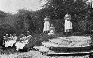 Aprons: Inmates in grounds, Inebriates Reformatory, Lewes, Sussex