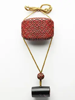 Netsuke: Inro with scroll design, attached to a netsuke and an ojime
