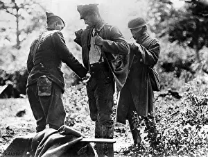 Searches: Inspection of a German prisoner, 1918