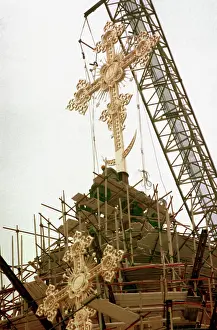 Tons: Installation of golden cross on top of Christ