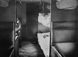 Bunks: Interior of Junkers plane with passenger sitting