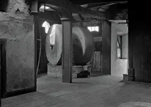 Millstone: Interior of a mill with two millstones