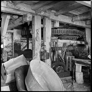 Clutter: Interior of the Old Mill at Nancledra showing drive wheels