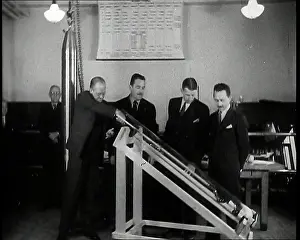 Inserting: Interior Shot of a British Man Inserting Various