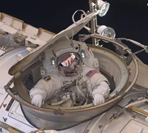 Spacesuits: International Space Station in 2011. Astronaut ?
