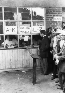 Interned: Interned Brits queue for mail, 1915