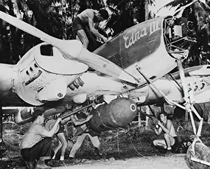 Inspecting: Interstate TDR-1 assault drone being prepared