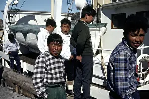 Inuits: Inuits Next to a Boat