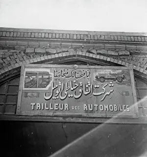 Tailleur: Iranian car mechanic sign