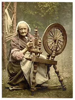 Spinner: Irish spinner and spinning wheel. County Galway, Ireland