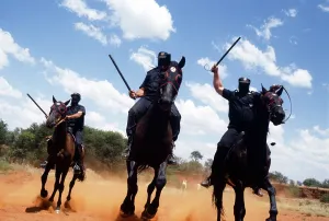 Afrikaner: Iron guard on horseback. Faces obscured by bandanas
