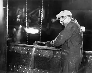 Sparking: Iron worker welding