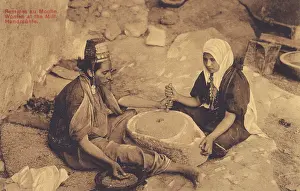 Quern: Israel - Women grind corn with a handmill