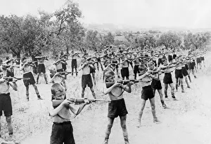 Grove: Italian Balilla boys during target practice, 1934