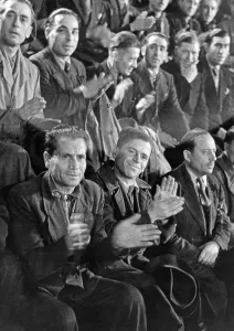 Migrants: Italian workers at a ceremony on the anniversary of the