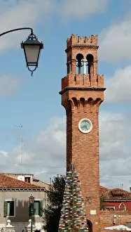 Lamppost: Italy. Island of Murano. Clock tower