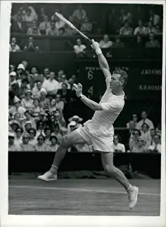 Rosewall: Jack Arkinstall in tennis match at Wimbledon