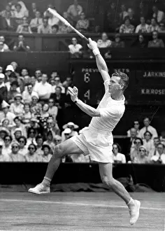 Rosewall: Jack Arkinstall in tennis match at Wimbledon