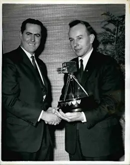 Surtees: Jack Brabham with John Surtees, trophy winner