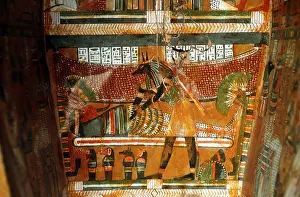 Osiris: Jackal-headed god Anubis receiving dead king or