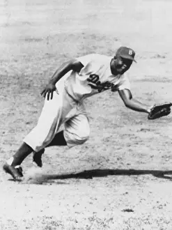 Dodgers: Jackie Robinson, fielding third base for ?