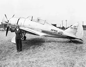 Seversky: Jacqueline Cochran with her new speed plane. The