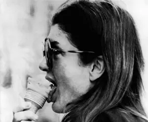 Licks: Jacqueline Kennedy Onassis licks an ice ?