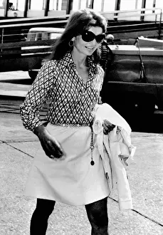Bouvier: Jacqueline Kennedy Onassis walks through ?