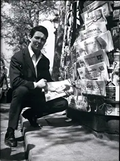 Sinners: Jacques Charrier, French actor, with newspaper rack