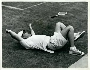 Pint: Jacques Grigry in tennis match at Wimbledon