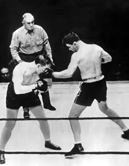 Braddock: James Braddock (right) pummels Tommy Farr ?