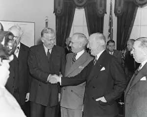 Outgoing: James Byrnes (right) congratulating George Marshall
