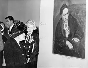 Genet: Janet Flanner (1892-1978) standing with ?