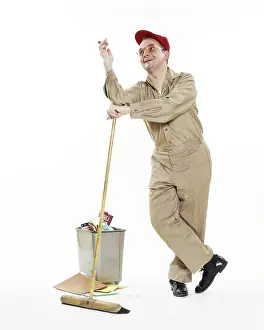Wastebasket: Janitor Maintenance Man Leaning on Broom