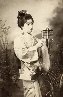 Crickets: Japan - Geisha with crickets in a small cage