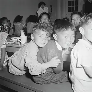 Schoolboy: A Japanese-American boy gets a hug from his