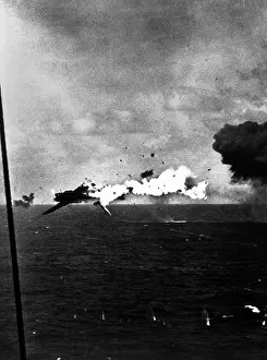 Kwajalein: Japanese bomber explodes after direct hit by 5