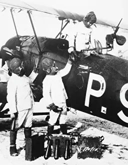 Thrown: A Japanese fighter plane is loaded with bombs, 1932
