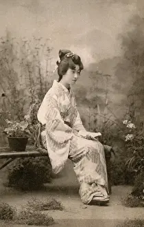 Flowerpot: Japanese Geisha seated on a bench