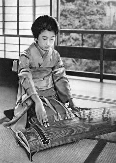 Mats: A Japanese Koto player