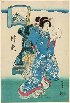 Snowballing: Japanese lady with large snowball