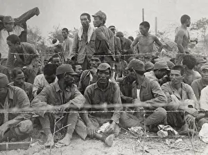 Saipan: Japanese POWs in an enclosure during the Battle