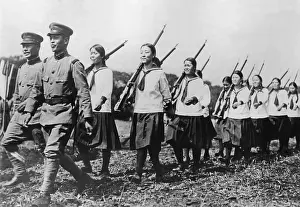 Schoolgirls: Japanese schoolgirls doing weapons training