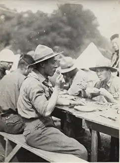 Trestle: Japanese scouts eating at camp