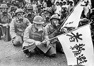 Squat: Japanese soldiers during an air-raid exercise, 1933