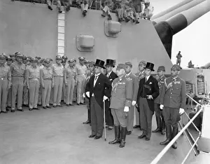 Top Hats: Japanese surrender signatories arrive aboard the