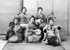 Taiko: Japanese women playing on samisen, fuye, taiko, and tsuzumi