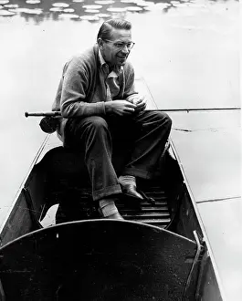 Jaroslav: Jaroslav Drobny, tennis player, fishing on lake in Surrey