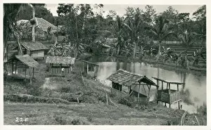 Mar19: Java, Indonesia - Small shelters on the riverbank
